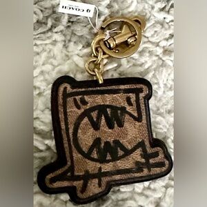 ‼️RARE‼️🎸Coach x Guang Yu🎸🔥NWT🔥REXY Bag Charm in Brown & Black